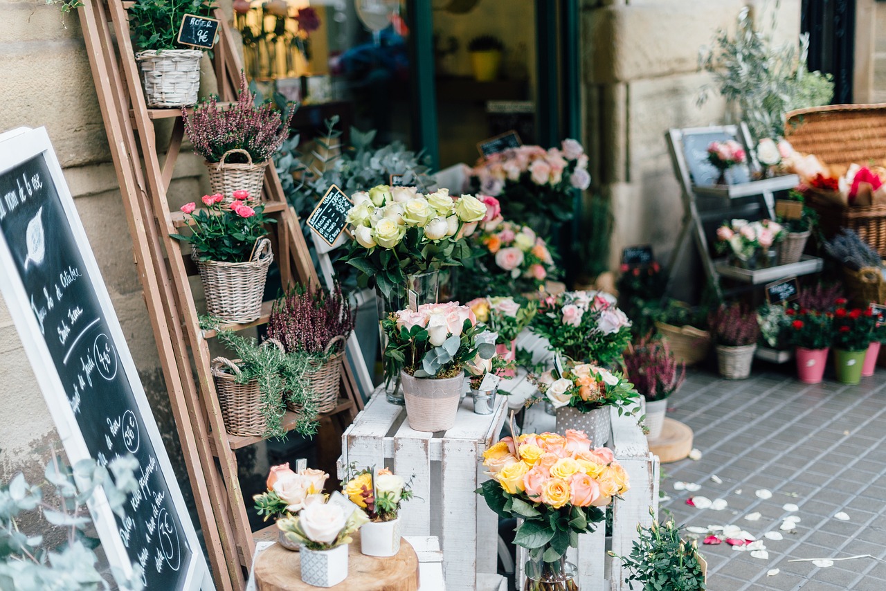 A florist counter with fresh flowers ready for customers.